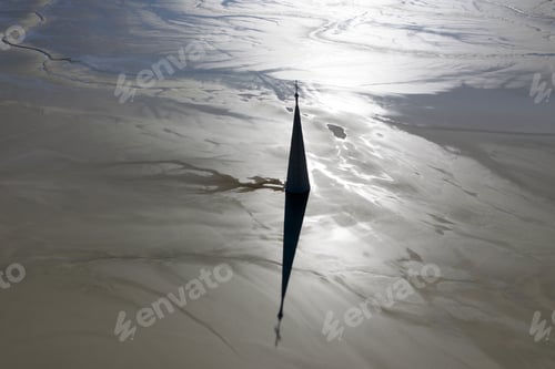 Preview: Aerial apocalyptic scene, silhouette of church tower with cross buried under mud