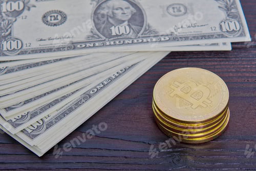 Preview: Dollar banknotes and Bitcoins on a table