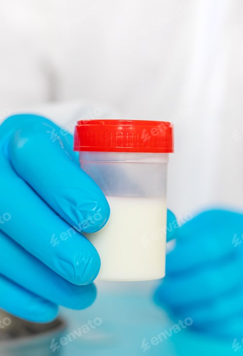 Preview: Examine milk in the laboratory. Selective focus.