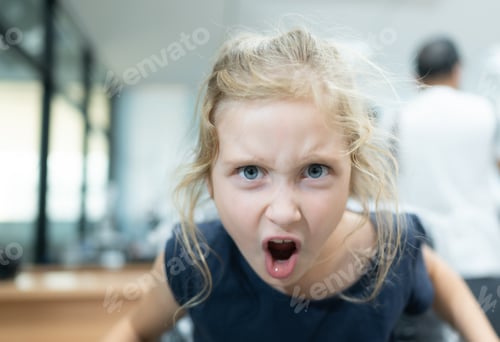 Preview: Portrait of little girl with blond hair in the hairdressing salon