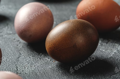 Preview: Easter eggs on a dark background