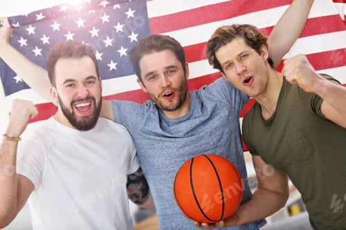 Preview: Happy american basketball fans cheering over flag