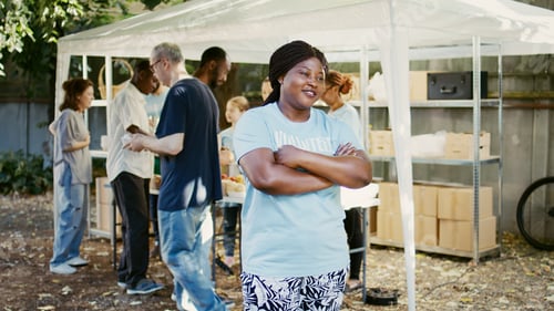 Preview: Young Female Volunteer at Food Drive