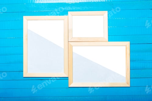 Preview: photo frames on the wooden wall