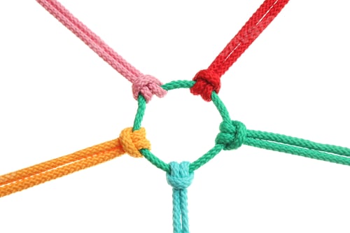 Preview: Colorful ropes tied together on white background. Unity concept