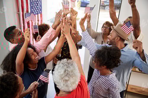 Preview: Three generation black family having an Independence Day party together at home,elevated view