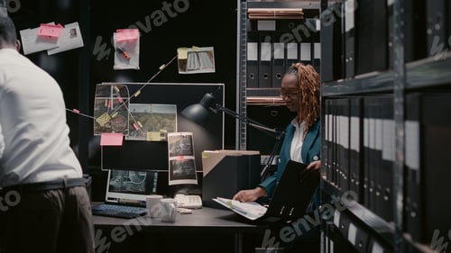 Preview: Detective inspectors doing background checks in archive