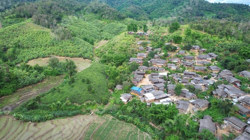 Preview: Aerial view from drone of the rural village and rice terraces in the mountains