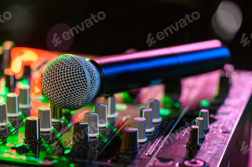 Preview: close up view of sound mixer with microphone in nightclub