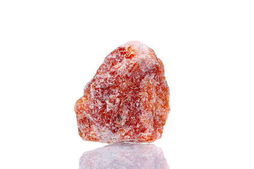 Preview: macro mineral stone orange calcite on a white background