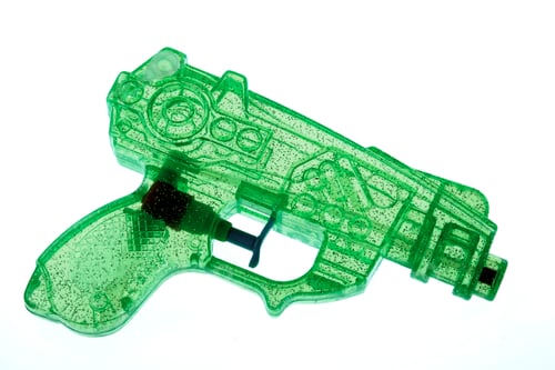 Preview: green plastic water gun isolated
