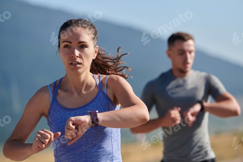Preview: Energized by the beauty of nature, a couple powers through their morning run, their bodies and