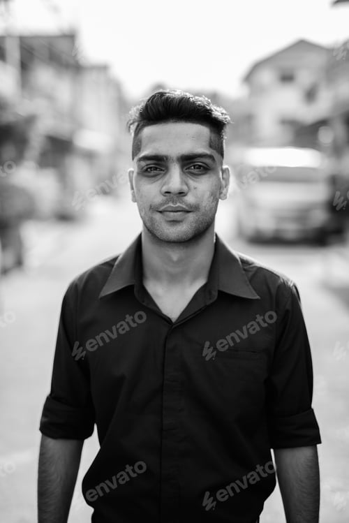 Preview: Young Indian businessman in the streets outdoors
