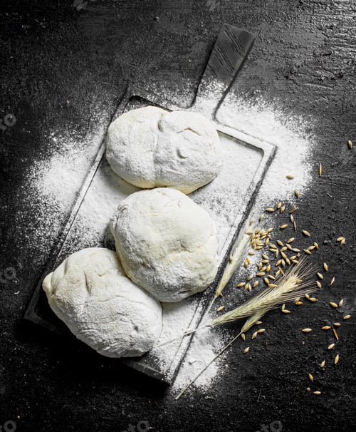 Preview: Pieces of dough with grain and spikelets.