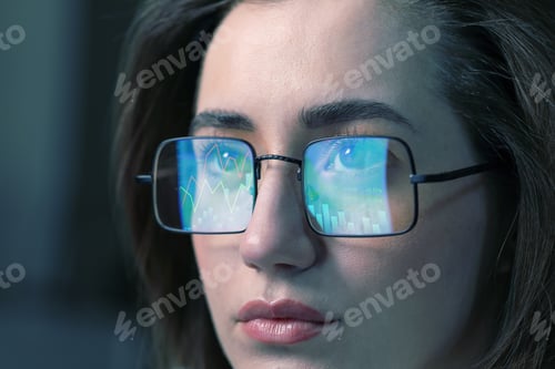 Preview: Stock exchange. Trader analyzing data, closeup. Graphs reflecting in her eyeglasses
