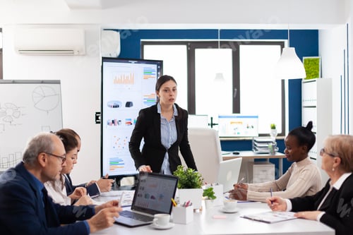 Preview: Furious entrepreneur hitting employee with clipboard
