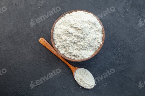 Preview: top view white flour inside plate on dark background dough bake cake pie biscuit dust