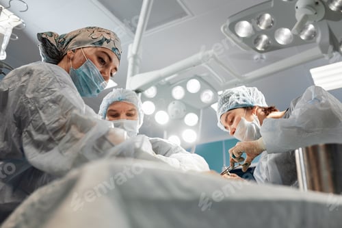 Preview: Surgical Team Performing Surgery in Operating Room