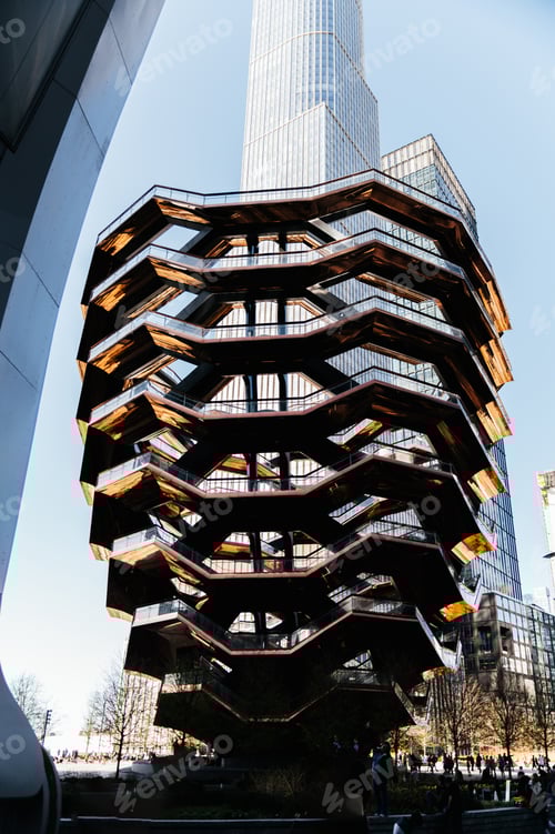 Preview: Exterior of modern spiral structure against skyscrapers in daylight