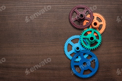 Preview: Colorful Gears On The Wooden Background