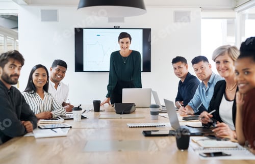 Preview: Portrait of a group of businesspeople having a meeting in a modern office