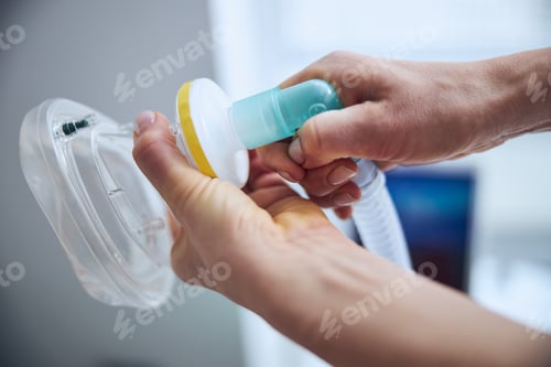 Preview: Female pulmonologist preparing for a medical procedure
