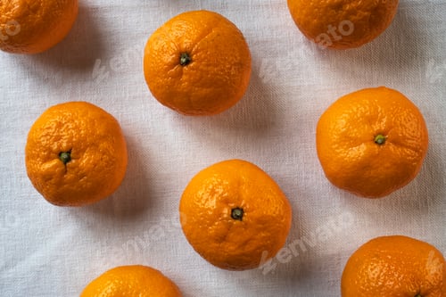 Preview: Fresh ripe mandarins on the table close-up.