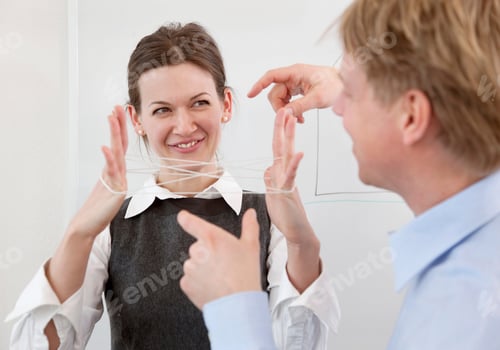 Preview: Businesspeople playing string game