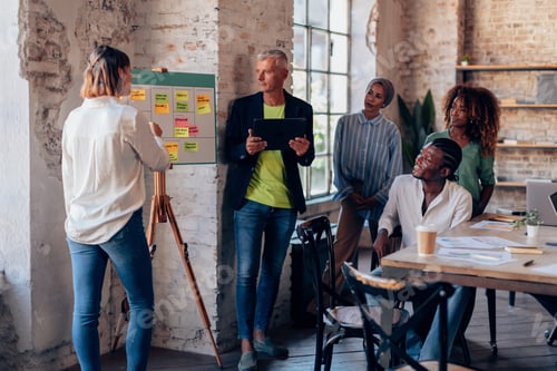 Preview: young group of creative people in meeting study solution in design office