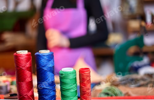 Preview: Close-up of colored threads in the studio of an Artisan