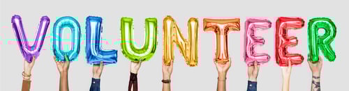 Preview: Rainbow alphabet balloons forming the word volunteer