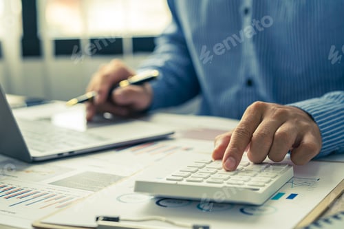 Preview: Close up account man hand using calculator for calculate and writing make a note with pen, financial