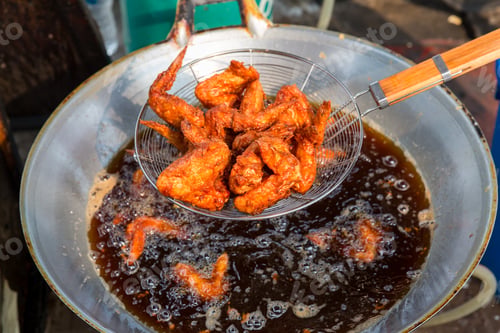 Preview: crispy fried chicken on street food market in Thailand. Delicious homemade crispy fried chicken.