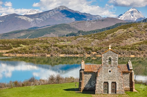 Preview: Picturesque chapel of Quintanilla in Riano mountain lake landscape. Spain