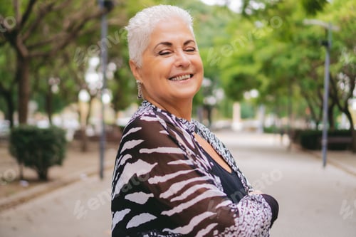 Preview: Smiling Woman Enjoying a Day in the Park