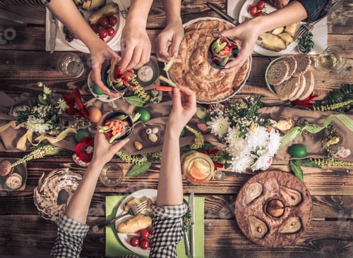 Preview: Apartment-feast of friends or family at the festive table.