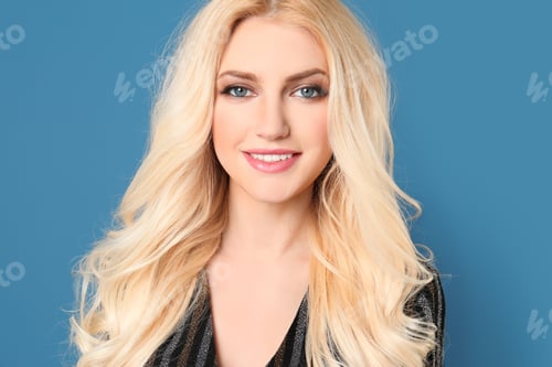 Preview: Portrait of young model with beautiful hair on color background