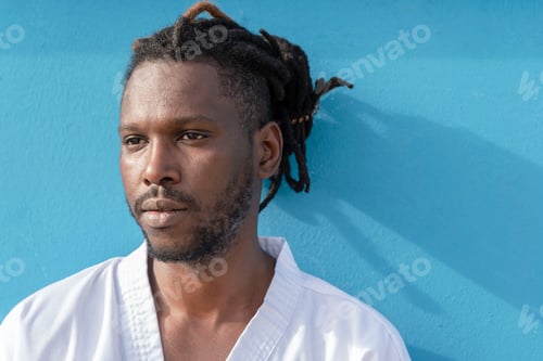 Preview: portrait of a handsome African American man on a blue background