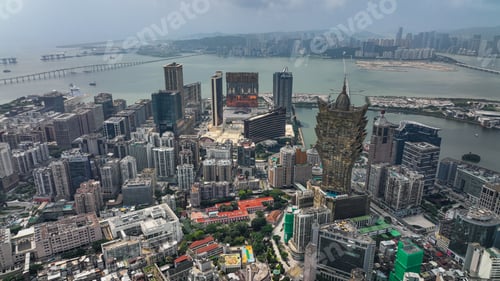 Preview: Aerial View of City With Bridge in Background