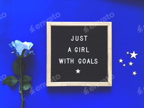 Preview: Inspirational Message on Black Board with Blue Background