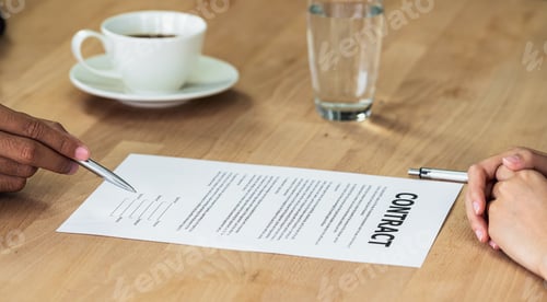 Preview: Closeup Young Asian woman graduate hand signing the contract after deal interview