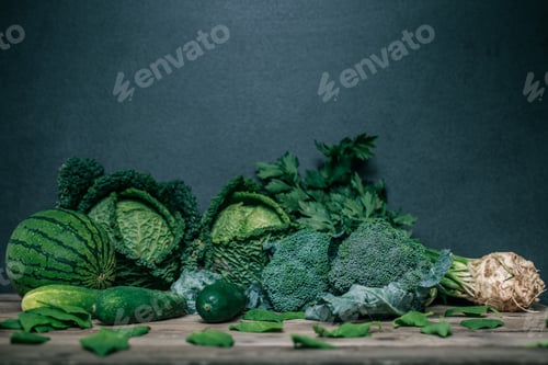 Preview: Various green vegetables on wooden table