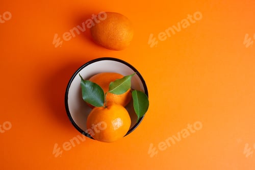 Preview: Closeup shot of appetizing oranges on the table, perfect for backgrounds