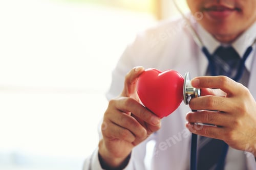 Preview: doctor holding hands with red heart in clinic office, Healthy lifestyle concept