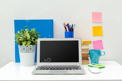 Preview: Work place of a creative person with a variety of colorful stationery objects
