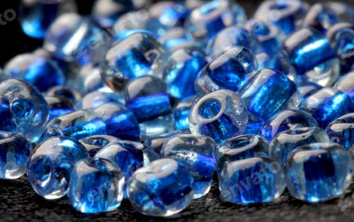 Preview: Blue Beads On A Black Background