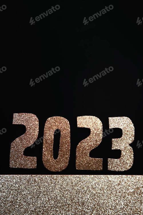 Preview: Happy New Year 2023. Golden numbers on a black background with glitter