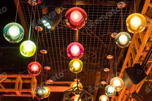 Preview: Colorful Bright Lamps Against A Dark Background