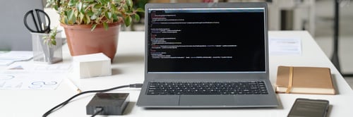 Preview: Header of Silver Laptop on Work Desk