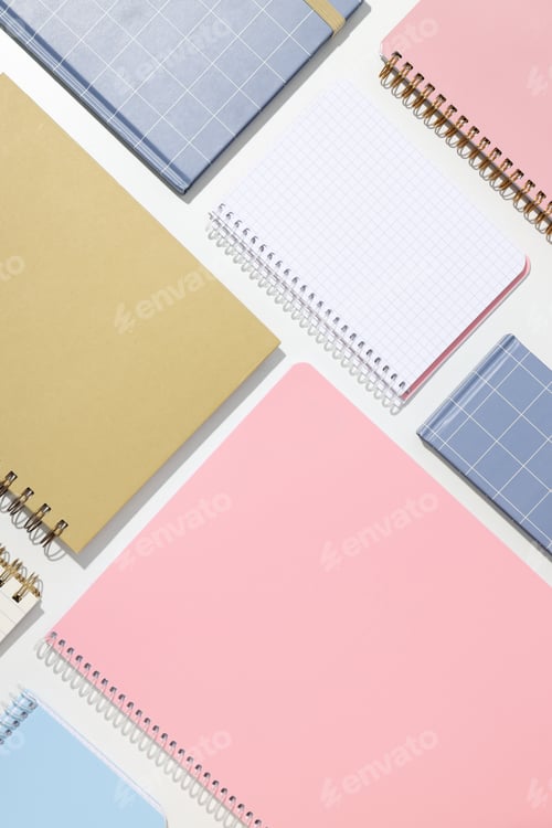 Preview: Different notebooks lie on a white background